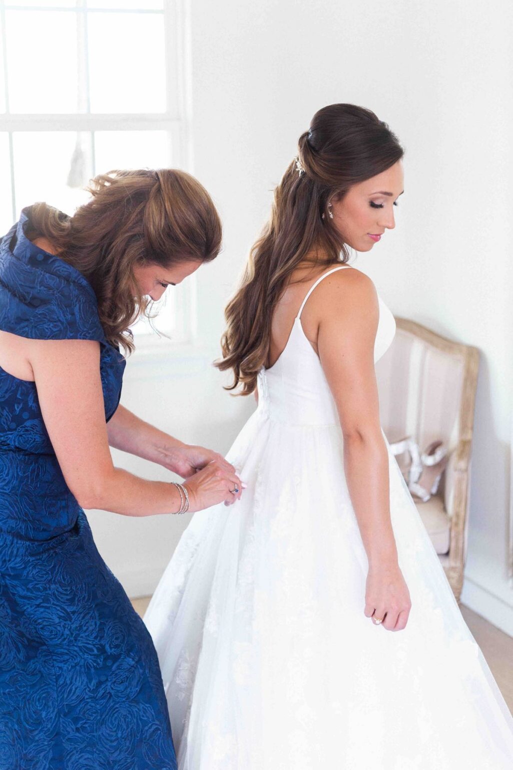 10 Mom Getting Bride in Dress